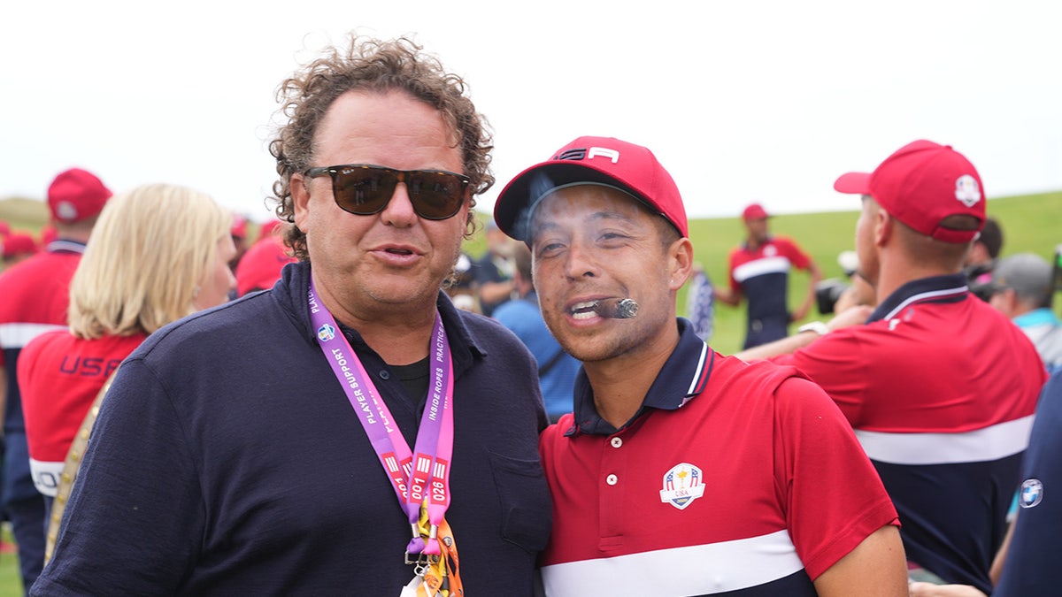 Xander Schauffele and dad