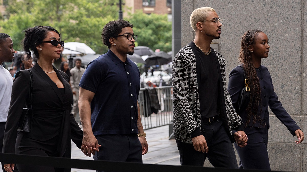 P. Diddy's children enter court before verdict released.