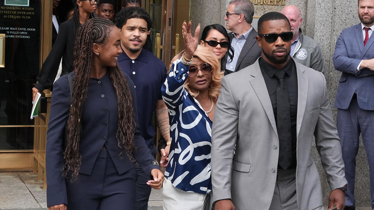 P. Diddy's mother exits court after he beats R.I.C.O case.