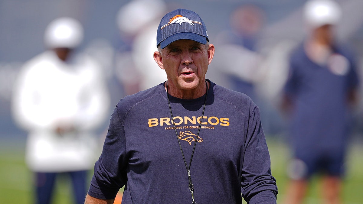 Sean Payton walks the sideline