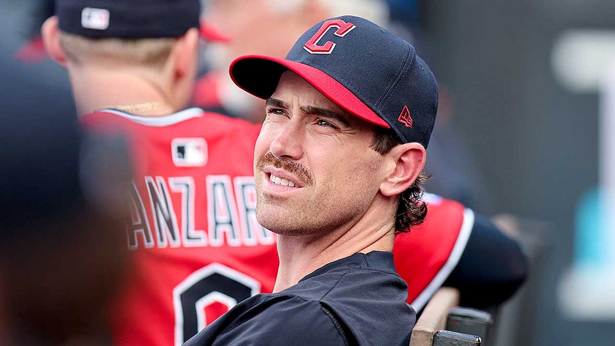 Shane Bieber looks on