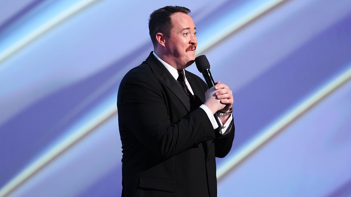 Shane Gillis with microphone