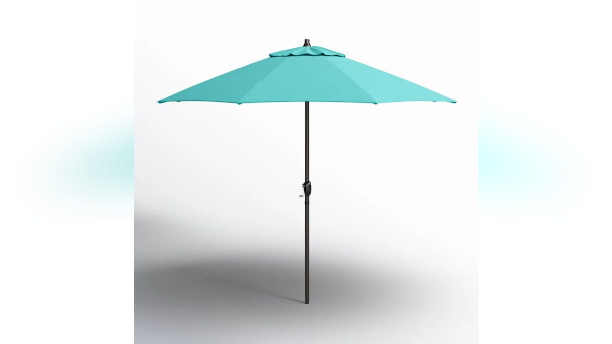This umbrella uses a crank system to easily open and close.