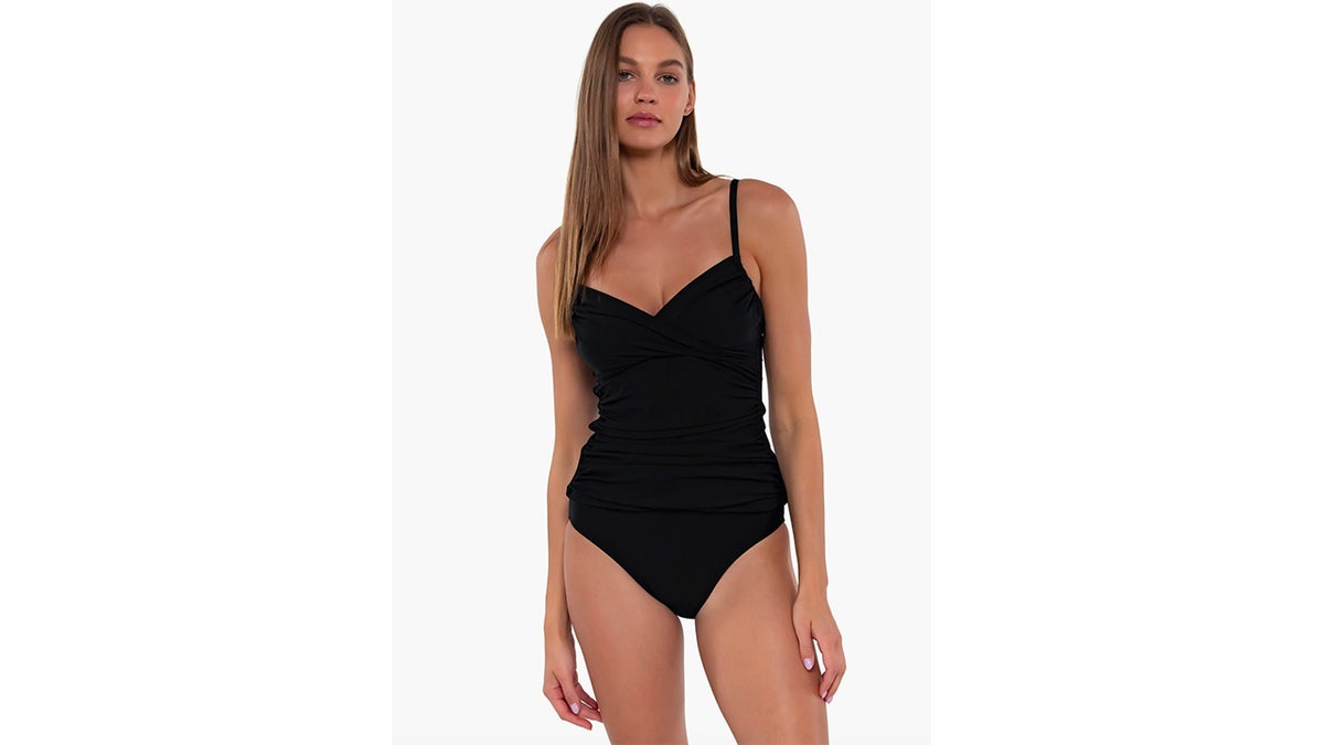 This tankini has a bra-like top with adjustable straps and soft molded cups, offering refined support without wires.