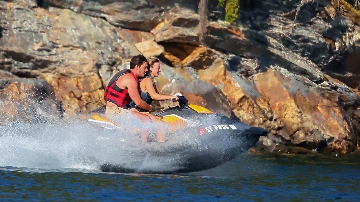 Sydney Sweeney maneuvers through water on jet ski