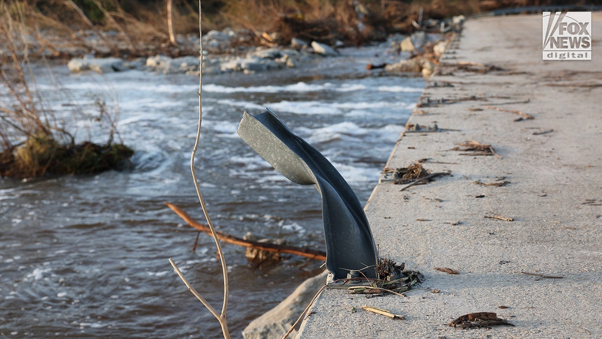 Road cracked and destroyed from flood harm successful Texas.
