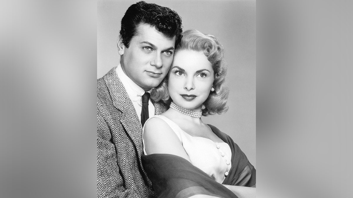 Black and white photo of Janet Leigh and Tony Curtis.