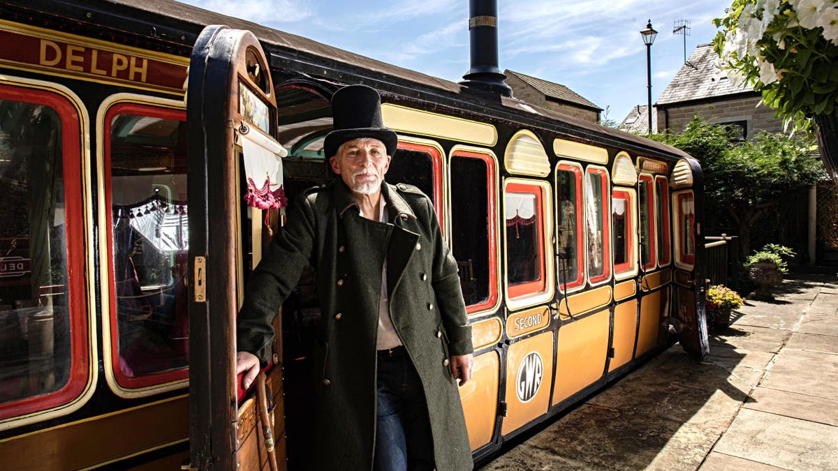 Nigel Brooke who lives in old railway station in Delph, Saddleworth, has refurbised an old classic train carriage in his garden and turned it into an Airbnb