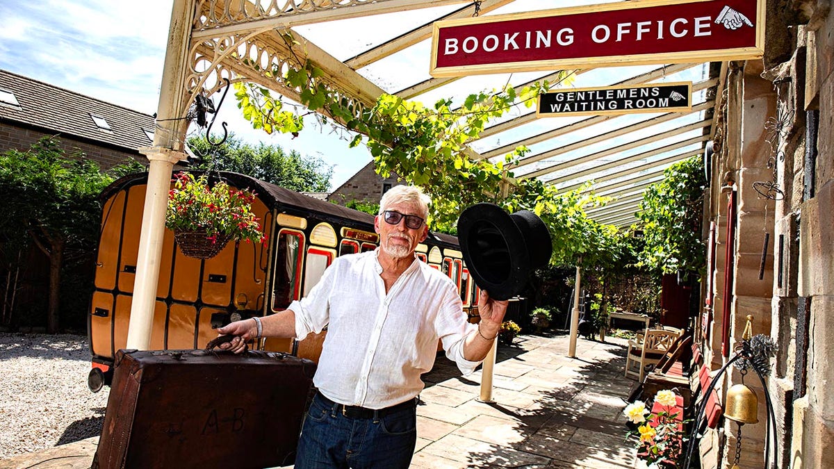 Nigel Brooke who lives in old railway station in Delph, Saddleworth, has refurbised an old classic train carriage in his garden and turned it into an Airbnb. See SWNS copy. 11/07/25