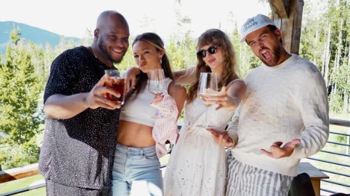 Travis Kelce and Taylor Swift with friends in the mountains
