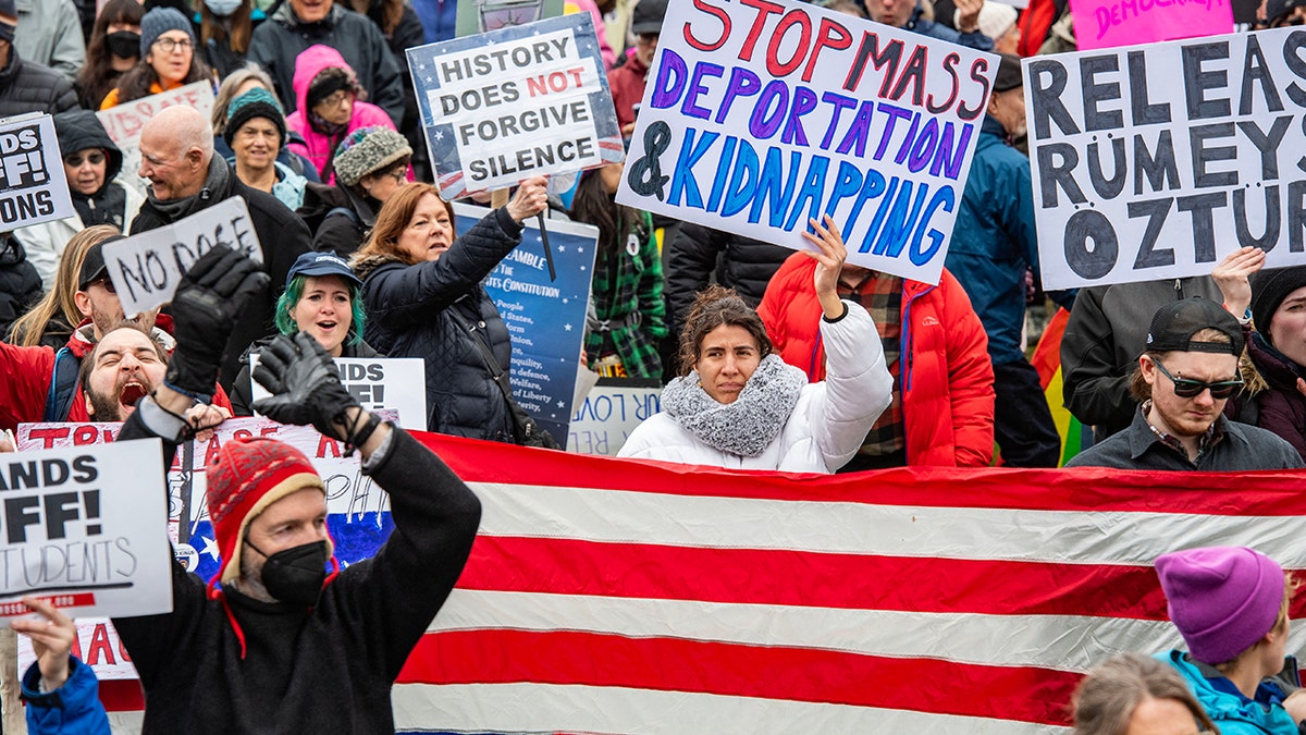 Demonstrators gather around the nation on slogans of Boston Common, cheering, and chan chan "Hands off!" Protest against President Donald Trump and his advisor, Tesla CEO Elon Musk (by Joseph Presioso / AFP) in Boston, Massachusetts on April 5, 2025 (photo by Joseph Presioso / AFP)