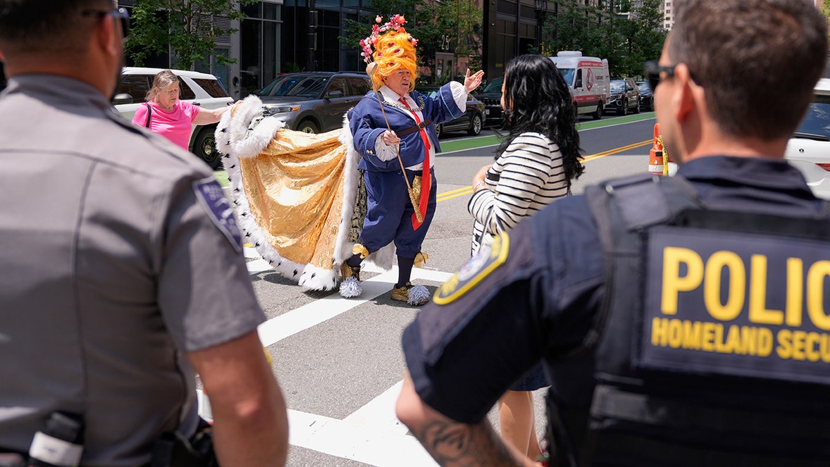 Trump costumed protester outside Boston federal courthouse