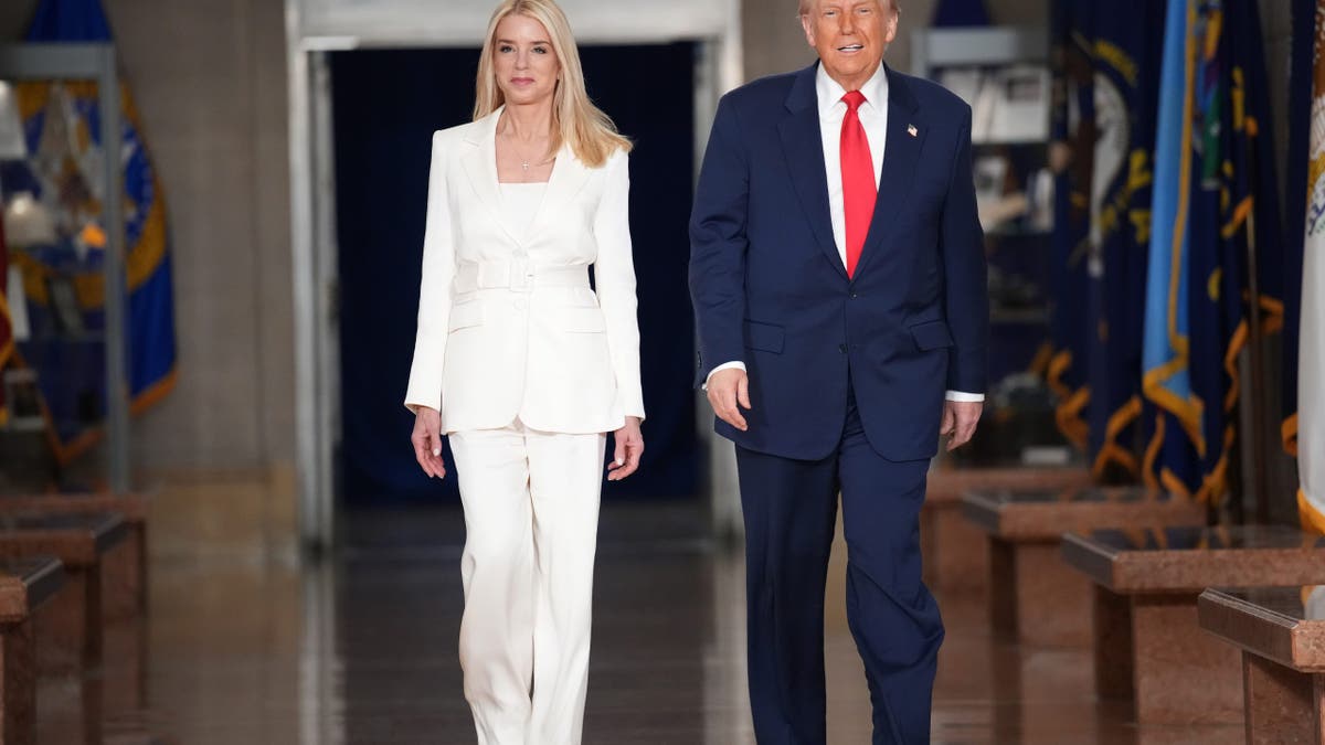 Trump walking with Pam Bondi