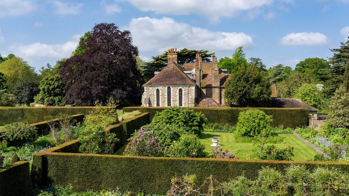 View of chapel and gardens at property