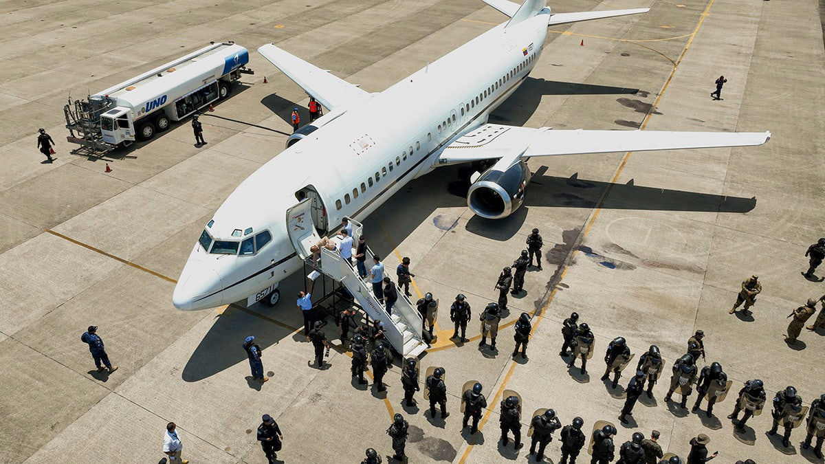 Venezuelans boarding flight