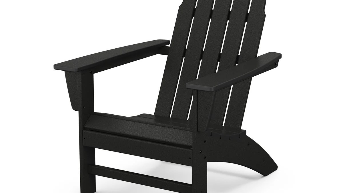 This classic Adirondack chair adds polished comfort to your yard or patio.