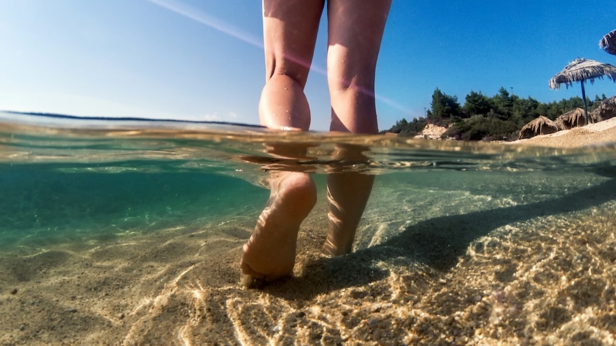 Wading in ocean