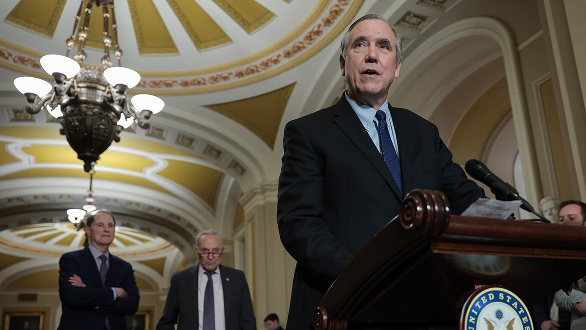 Merkley, Schumer and Wyden at a press conference on Capitol Hill