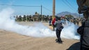 Immigration operation at California cannabis farms leads to clash between federal agents and protesters