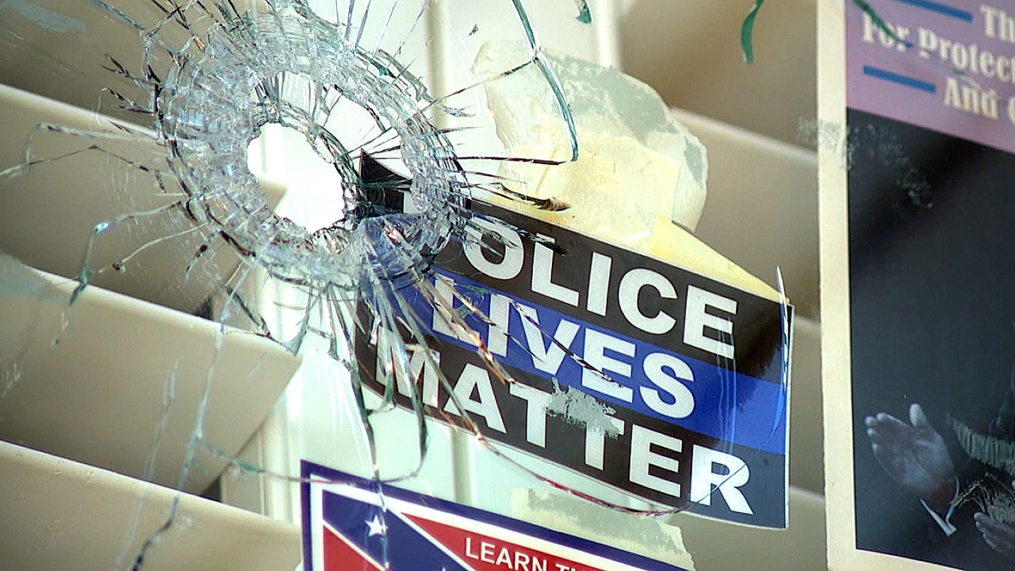 Defiant homeowner refuses to remove Trump support after bullets hit windows
