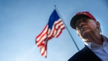President Donald Trump with American Flag in background