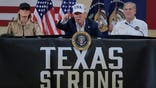 KERRVILLE, TEXAS - JULY 11: President Donald Trump, first lady Melania Trump and Texas Governor Greg Abbott participate in a round table event at the Hill Country Youth Event Center to discuss last week's flash flooding on July 11, 2025 in Kerrville, Texas. Trump traveled to Texas one week after flash flooding along the Guadalupe River swept through cities, mobile home parks and summer camps, killing 120 people. Ninety-six of those killed were in Kerr County, where the toll includes at least 36 children. (Photo by Chip Somodevilla/Getty Images)
