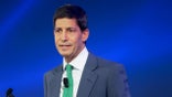Kevin Warsh, former governor of the U.S. Federal Reserve, speaks during an IMF meeting.