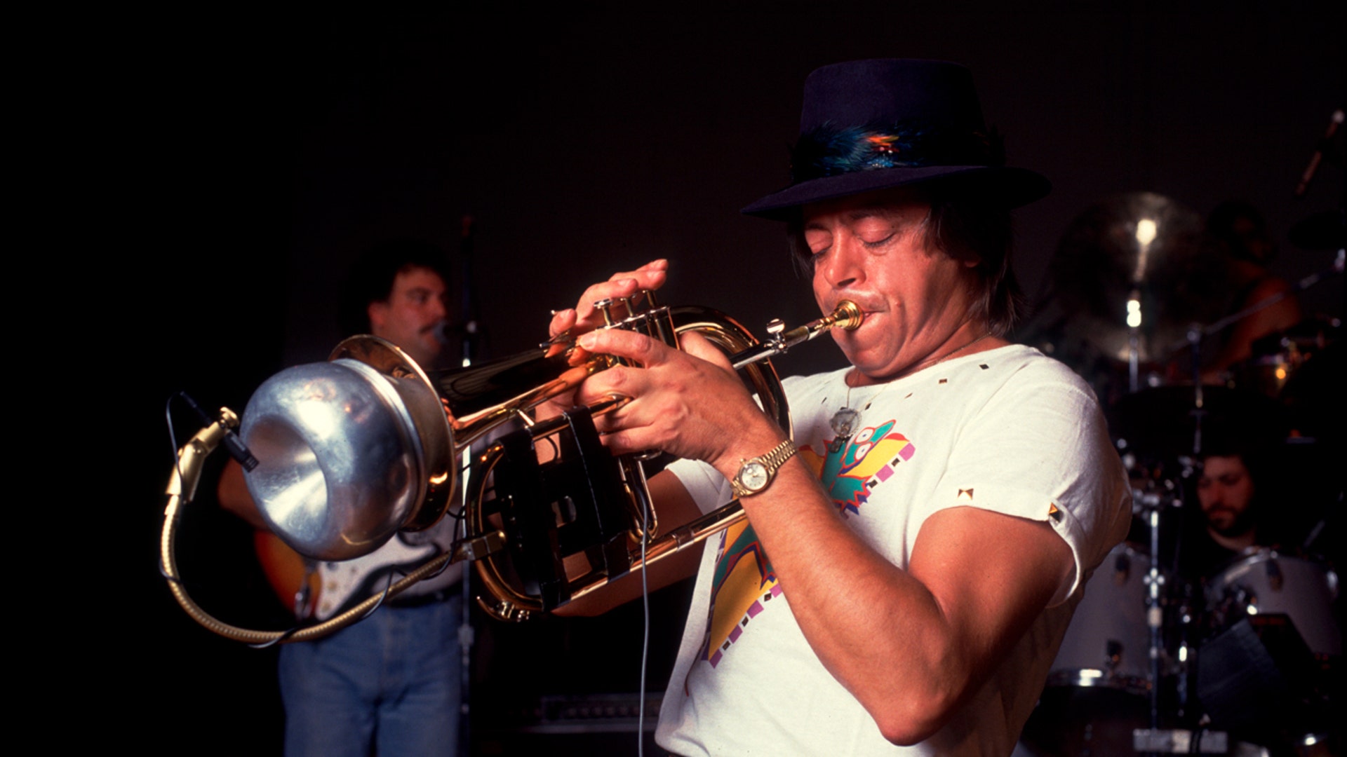 Chuck Mangione plays at an event