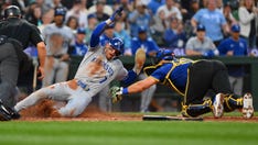 Royals' Bobby Witt Jr pulls off epic slide to avoid tag at home plate