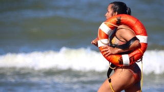 Lifeguards save young boy, 5 years old, as he's pulled unconscious from ocean
