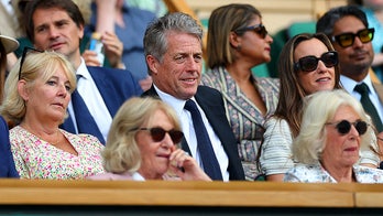 Hugh Grant falls asleep at Wimbledon tennis match while seated behind Queen Camilla