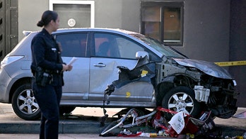 California man accused of ramming car into LA crowd is convicted felon out on parole, police say