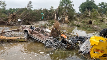 Texas flood survivor forced to break through window, cling to meter box for hours to stay alive