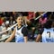 Sky star Angel Reese reacts after slapping clipboard out of coach's hand