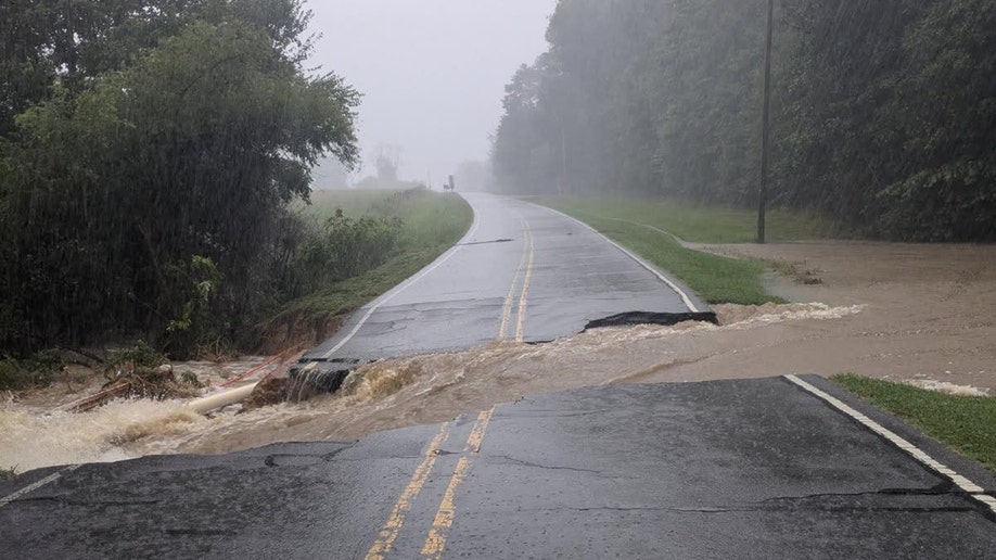 Floodwaters cutting done information of NC Hwy 902 that partially collapsed successful Chatham County