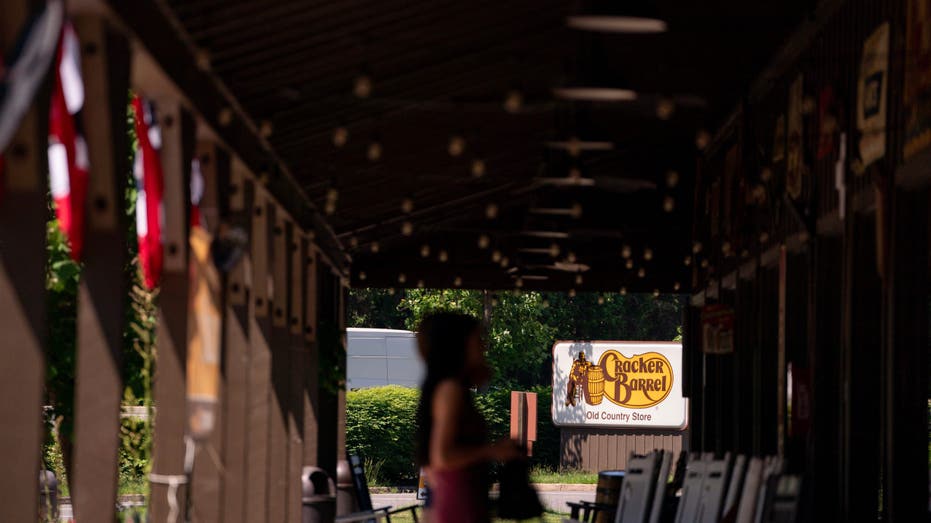 Cracker Barrel sign seen at end of porch of a CB restaurant