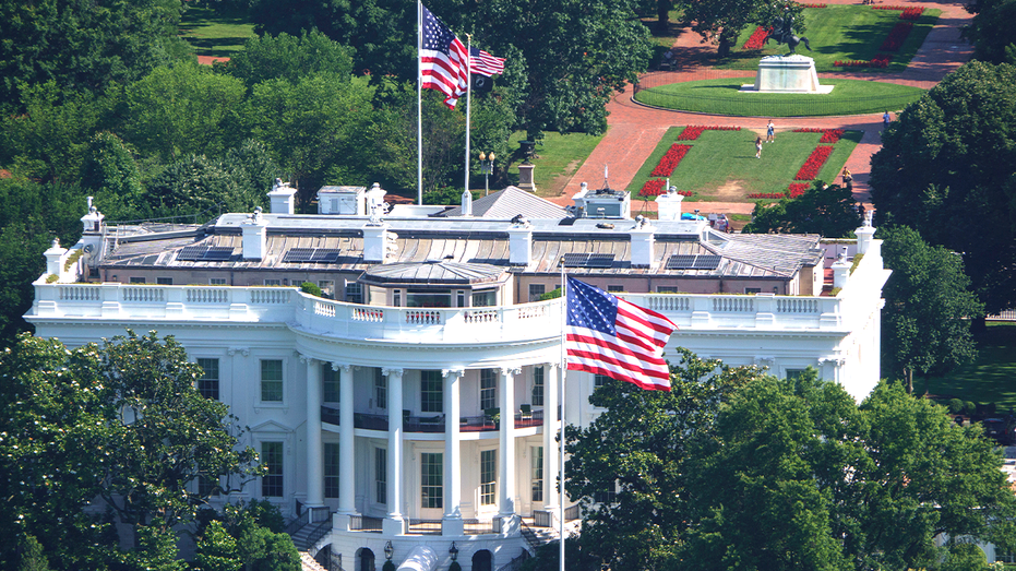 Trump installs massive new American flags at the White House - and they don't cost taxpayers a penny