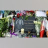 Flowers and letters at the funeral for Ozzy Osbourne.