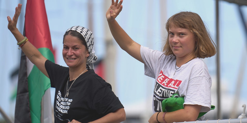 Boats in a flotilla departing Barcelona