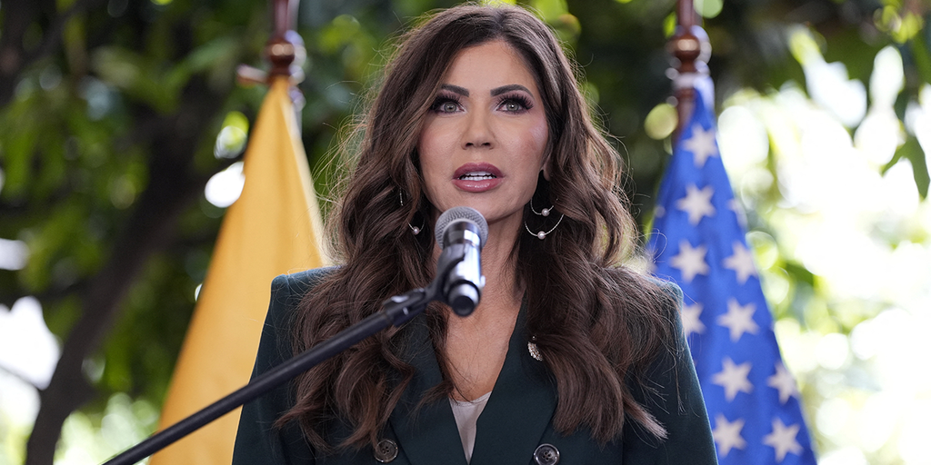 https://a57.foxnews.com/static.foxnews.com/foxnews.com/content/uploads/2025/08/1024/512/noem-reuters-flag-background.png?ve=1&tl=1