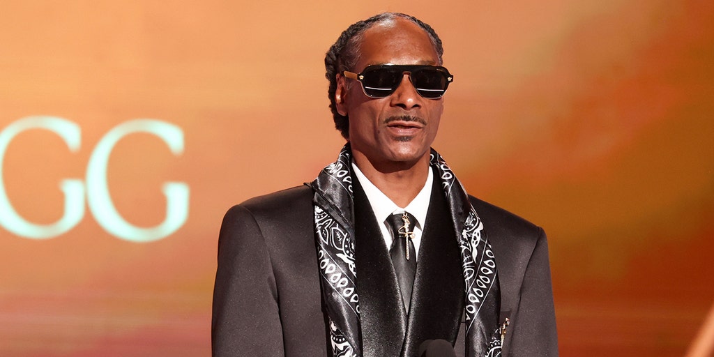 Snoop Dogg says same-sex couple with baby in 'Lightyear' confused his  grandson | Fox News