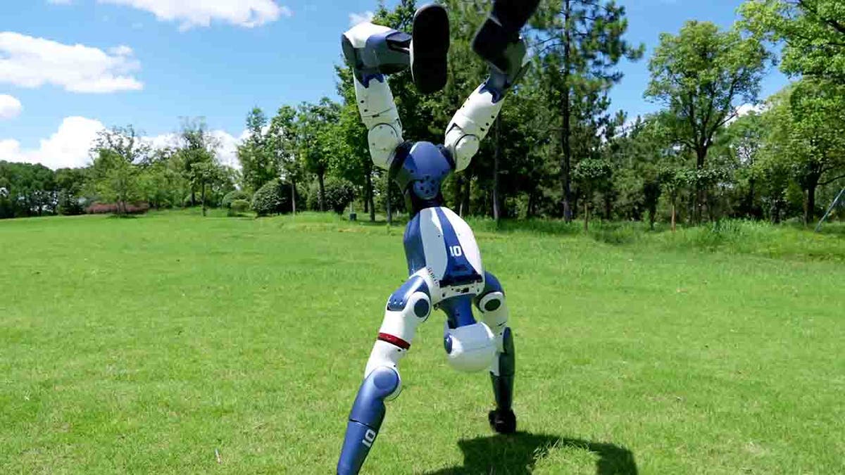 R1 humanoid robot doing a handstand.