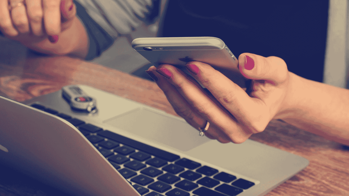 A woman viewing her 401(k) info on her laptop.