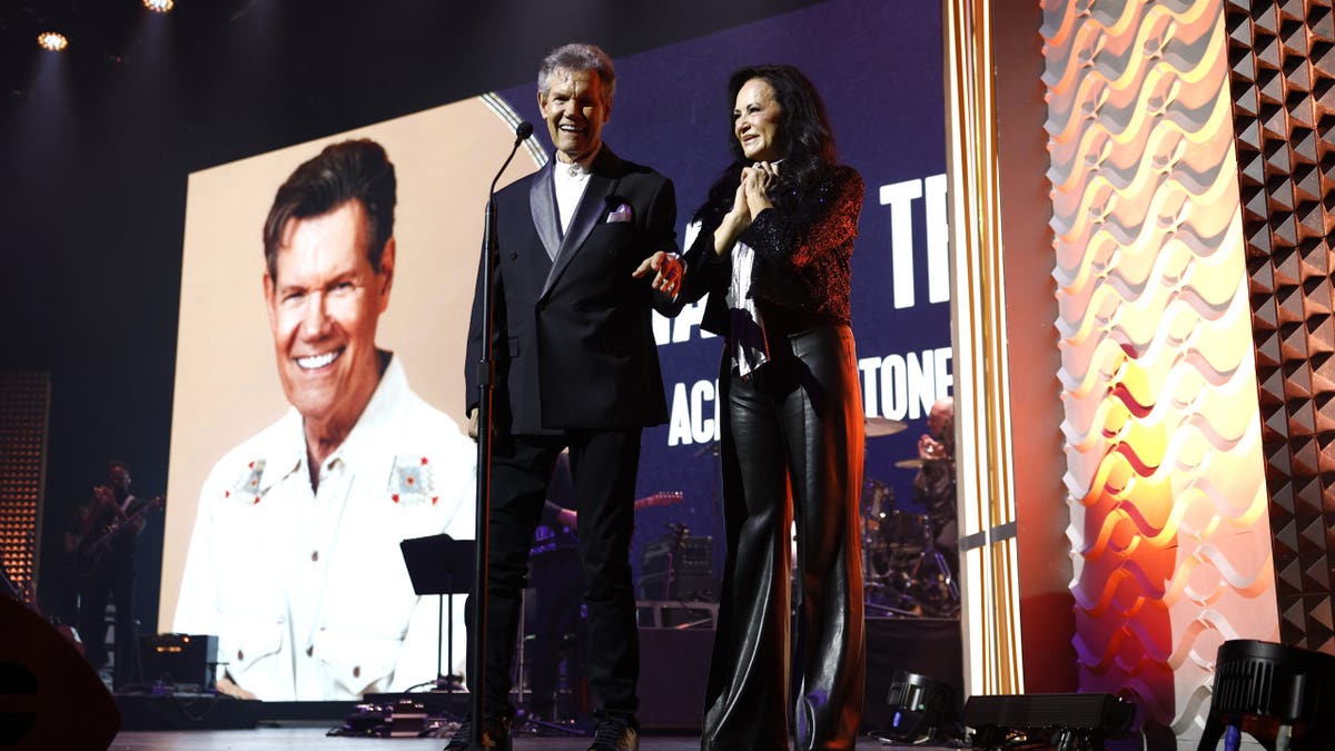 Randy and Mary Travis onstage ACM honors