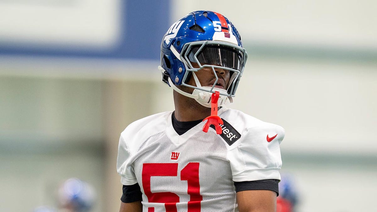Abdul Carter looks on the practice field