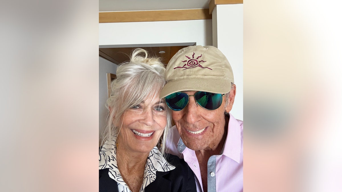 Joanna Cassidy and Alan Hamel smiling in a selfie.