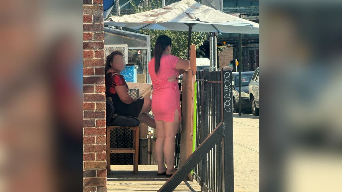 Alleged sex workers outside Queens brothel