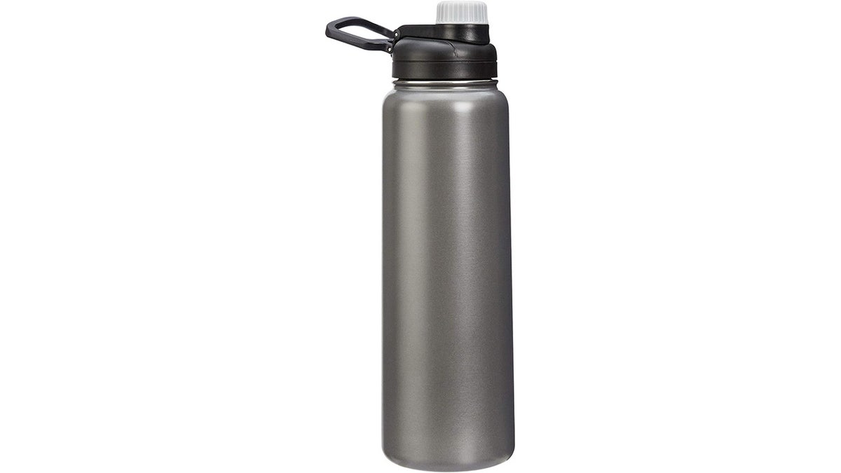 This stainless steel bottle offers double‑wall vacuum insulation and a spout lid that seals tightly.