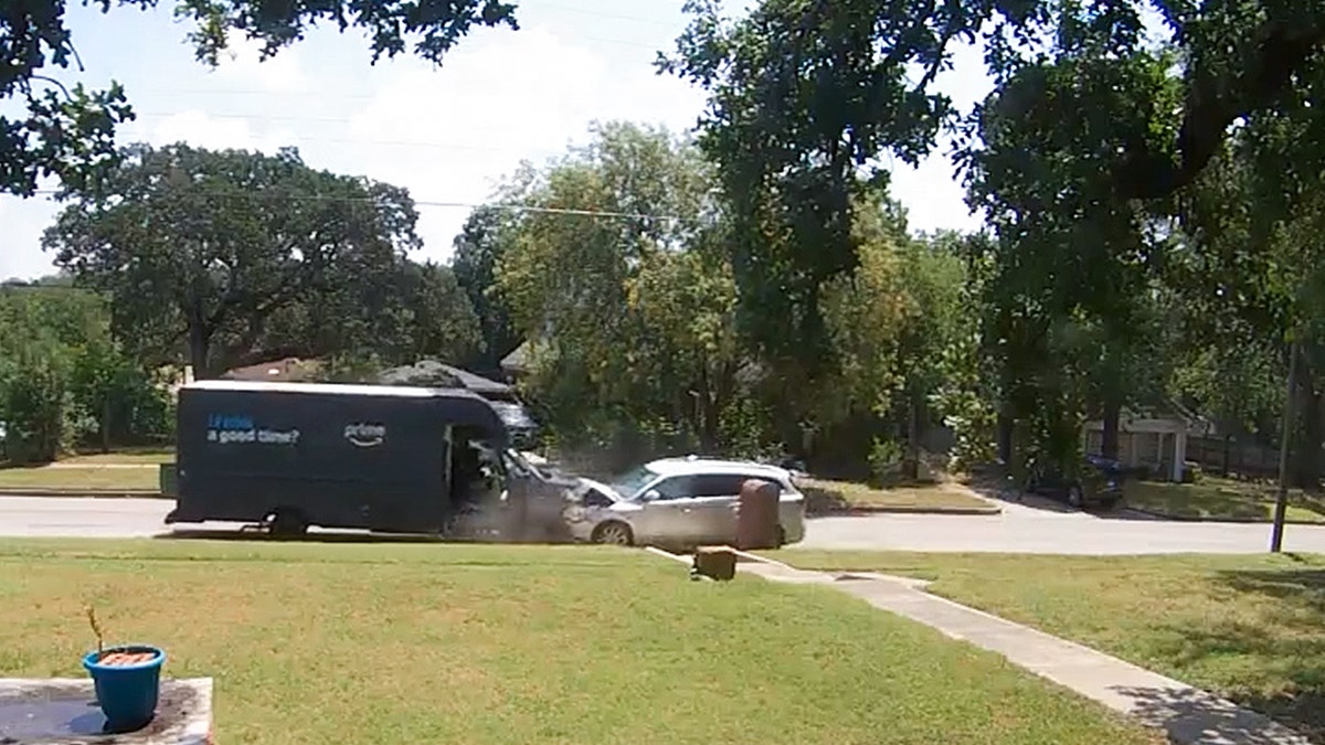 car slams into Amazon delivery vehicle in suburban neighborhood