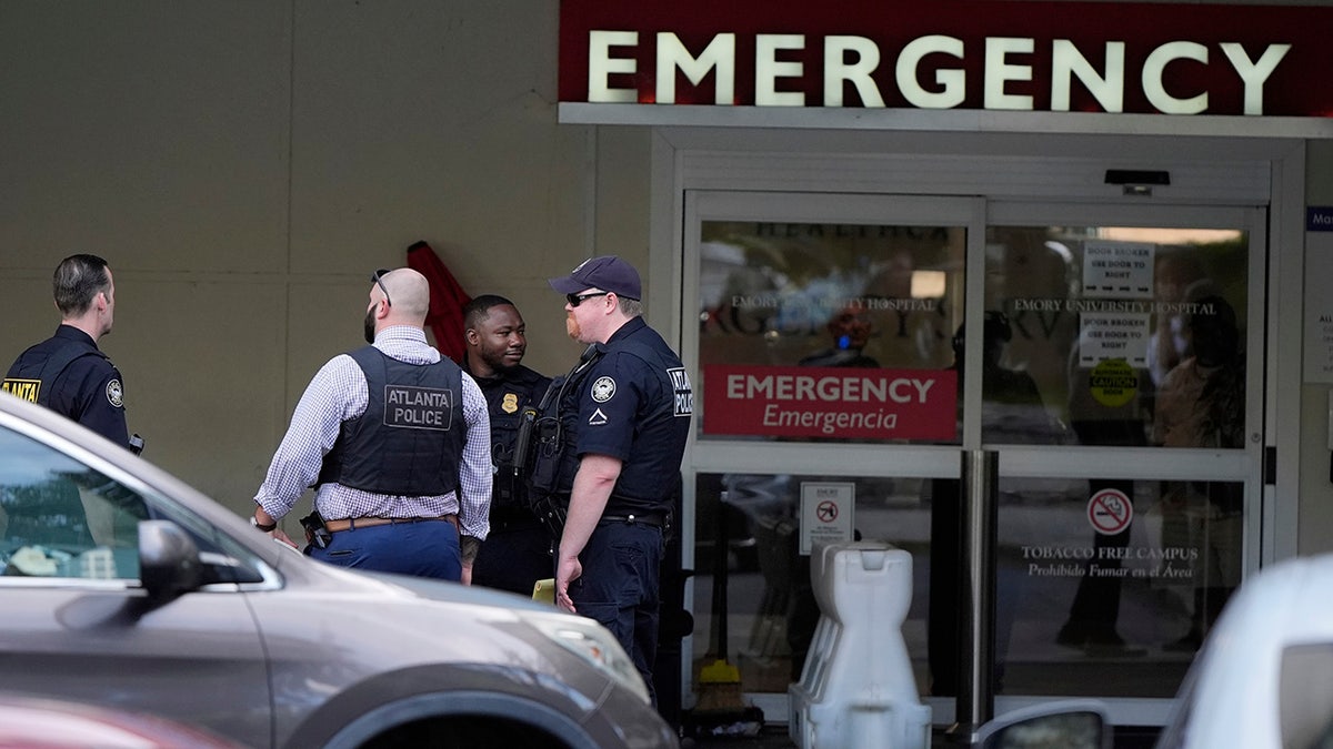 atlanta-shooting-emory-cdc-scene Police officers and gunmen died after shooting near the CDC near Emery University in Atlanta